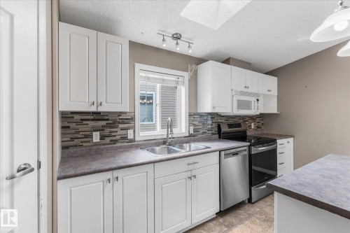 856 53222 Range Road 272, Rural Parkland County, AB - Indoor Photo Showing Kitchen With Double Sink