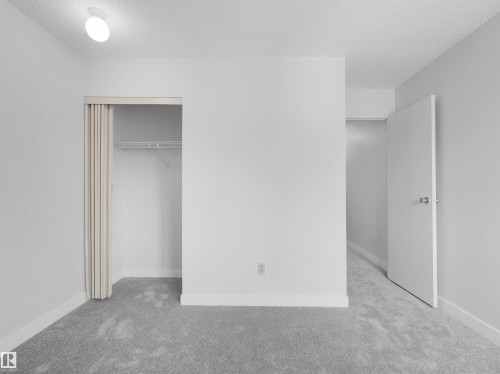 #50 1904 48 St Nw, Edmonton, AB - Indoor Photo Showing Other Room