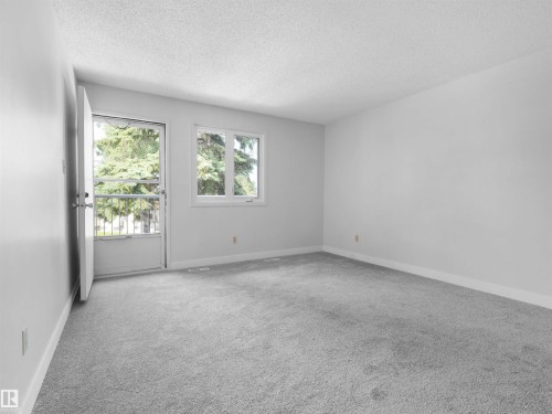 #50 1904 48 St Nw, Edmonton, AB - Indoor Photo Showing Other Room