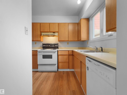 #50 1904 48 St Nw, Edmonton, AB - Indoor Photo Showing Kitchen With Double Sink