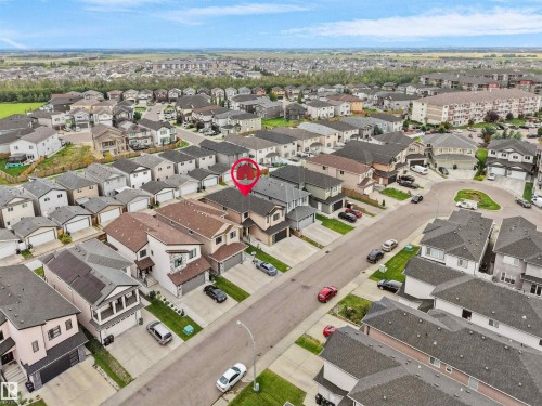 Aerial perspective of a developed residential area with a mix of detached and attached homes - 17020 62 Street Nw, Edmonton, AB - Outdoor With View