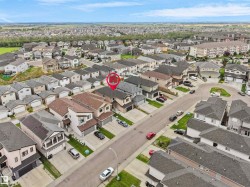 Aerial perspective of a developed residential area with a mix of detached and attached homes - 