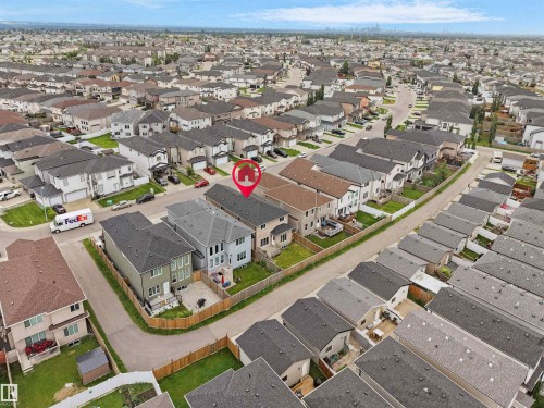 Aerial view of a residential neighborhood with uniformly designed homes - 17020 62 Street Nw, Edmonton, AB -  With View