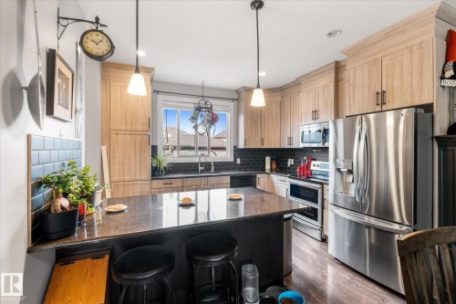 116 Gilmore Way, Spruce Grove, AB - Indoor Photo Showing Kitchen With Upgraded Kitchen