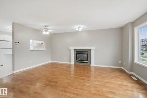 3104 32 Avenue Nw, Edmonton, AB - Indoor Photo Showing Living Room With Fireplace