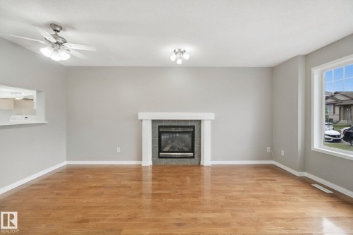 3104 32 Avenue Nw, Edmonton, AB - Indoor Photo Showing Living Room With Fireplace