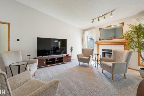 619 Revell Wynd Nw, Edmonton, AB - Indoor Photo Showing Living Room With Fireplace