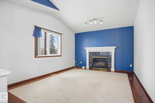 11413 118 Street Nw, Edmonton, AB - Indoor Photo Showing Living Room With Fireplace