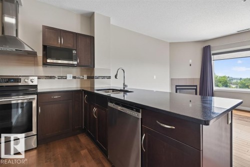#303 35 Sturgeon Rd, St. Albert, AB - Indoor Photo Showing Kitchen With Stainless Steel Kitchen With Double Sink With Upgraded Kitchen