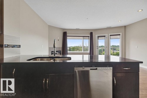 #303 35 Sturgeon Rd, St. Albert, AB - Indoor Photo Showing Kitchen With Double Sink