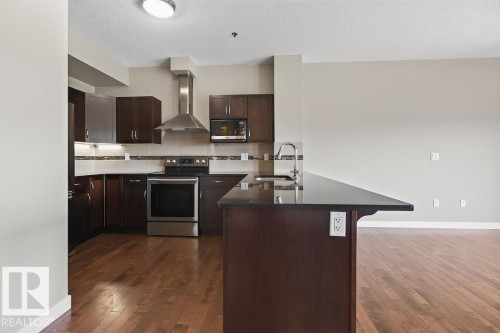 #303 35 Sturgeon Rd, St. Albert, AB - Indoor Photo Showing Kitchen With Stainless Steel Kitchen
