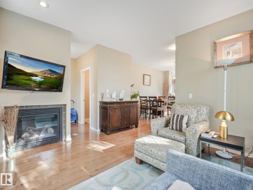 #55 603 Watt Bv Sw, Edmonton, AB - Indoor Photo Showing Living Room With Fireplace