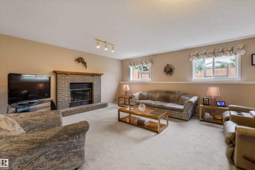 2 Dunvegan Crest, St. Albert, AB - Indoor Photo Showing Living Room With Fireplace