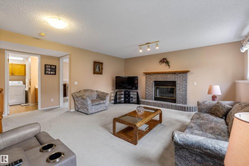 2 Dunvegan Crest, St. Albert, AB - Indoor Photo Showing Living Room With Fireplace