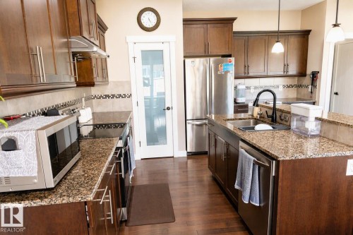 711 57 St Sw, Edmonton, AB - Indoor Photo Showing Kitchen With Double Sink With Upgraded Kitchen