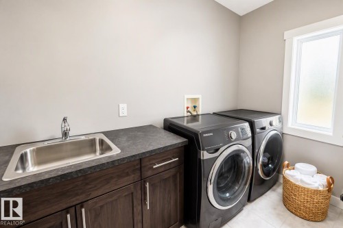711 57 St Sw, Edmonton, AB - Indoor Photo Showing Laundry Room