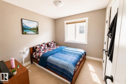 711 57 St Sw, Edmonton, AB - Indoor Photo Showing Bedroom