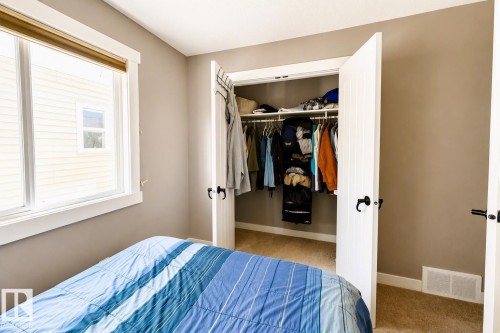 711 57 St Sw, Edmonton, AB - Indoor Photo Showing Bedroom