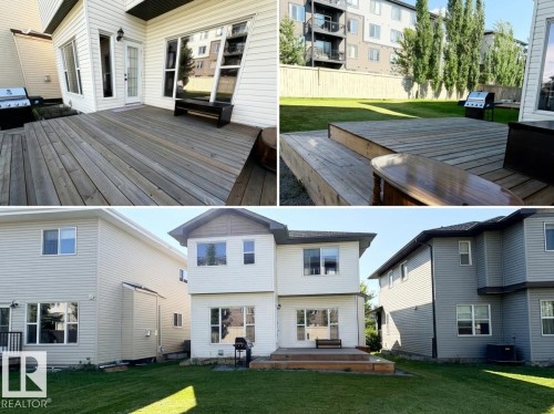 Property Exterior and Backyard. Depicting the rear facade of the property, the deck, and the surrounding grounds - 711 57 St Sw, Edmonton, AB - Outdoor With Exterior