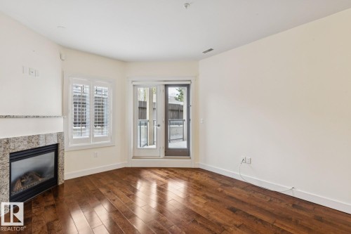 #16 11518 76 Av Nw, Edmonton, AB - Indoor With Fireplace