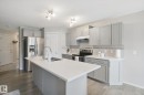 735 176 Street Sw, Edmonton, AB  - Indoor Photo Showing Kitchen With Double Sink With Upgraded Kitchen 