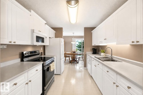 #212 9535 176 St Nw, Edmonton, AB - Indoor Photo Showing Kitchen With Double Sink