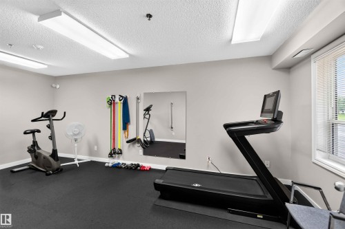 #212 9535 176 St Nw, Edmonton, AB - Indoor Photo Showing Gym Room