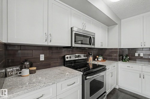 1135 177 Street Sw, Edmonton, AB - Indoor Photo Showing Kitchen With Upgraded Kitchen