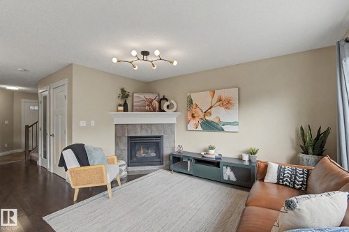 1135 177 Street Sw, Edmonton, AB - Indoor Photo Showing Living Room With Fireplace