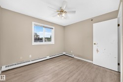 Wood-finish flooring with neutral wall tones - 
