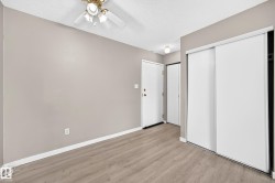 Wood-finish flooring with neutral wall tones - 