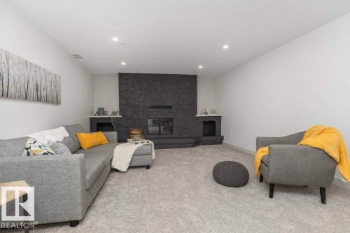 4703 117 Street Nw, Edmonton, AB - Indoor Photo Showing Living Room With Fireplace