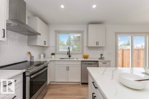 4703 117 Street Nw, Edmonton, AB - Indoor Photo Showing Kitchen With Double Sink With Upgraded Kitchen