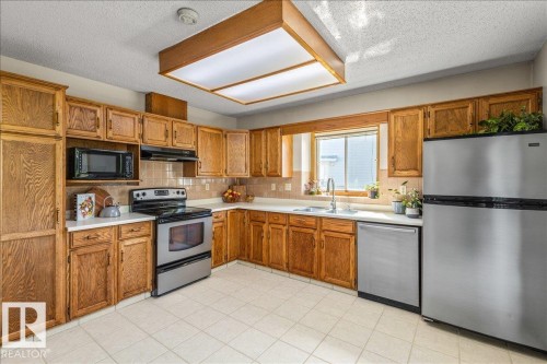 6 Laird Place, St. Albert, AB - Indoor Photo Showing Kitchen With Double Sink