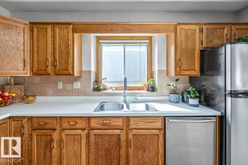 6 Laird Place, St. Albert, AB - Indoor Photo Showing Kitchen With Double Sink