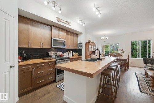 56 Hartwick Manor, Spruce Grove, AB - Indoor Photo Showing Kitchen With Double Sink