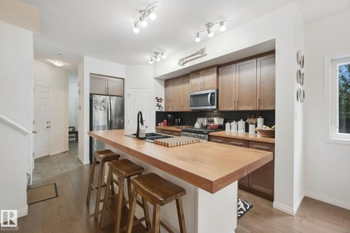 56 Hartwick Manor, Spruce Grove, AB - Indoor Photo Showing Kitchen With Double Sink
