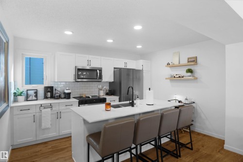 #29 1025 Secord Pm Nw, Edmonton, AB - Indoor Photo Showing Kitchen With Upgraded Kitchen