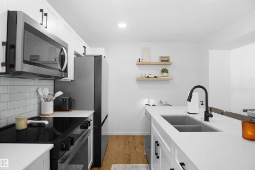 #29 1025 Secord Pm Nw, Edmonton, AB - Indoor Photo Showing Kitchen With Double Sink With Upgraded Kitchen