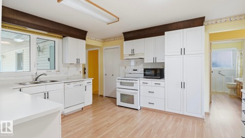 Additional content - 8408 176 Street Nw, Edmonton, AB - Indoor Photo Showing Kitchen With Double Sink