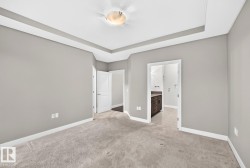 Recessed tray ceiling with central flush mount lighting - 