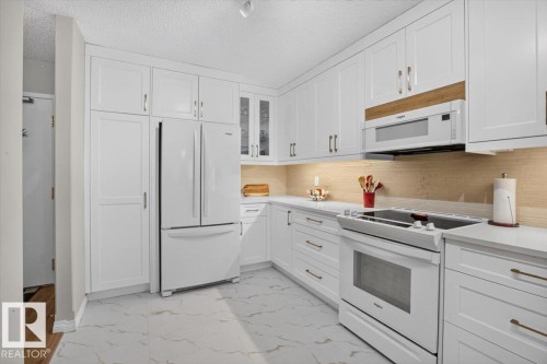 #300 7839 96 St Nw, Edmonton, AB - Indoor Photo Showing Kitchen