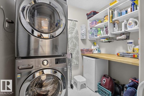 Organized by California Closets - #300 7839 96 St Nw, Edmonton, AB - Indoor Photo Showing Laundry Room