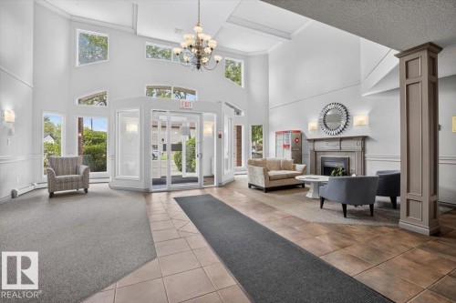 #300 7839 96 St Nw, Edmonton, AB - Indoor With Fireplace