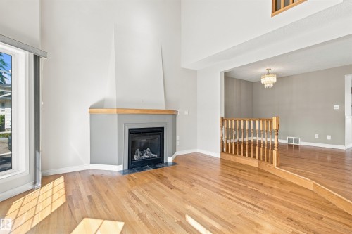 #1 3311 58 St Nw, Edmonton, AB - Indoor Photo Showing Living Room With Fireplace