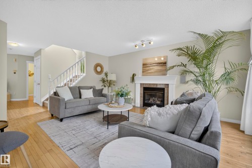 1322 Barnes Close Sw, Edmonton, AB - Indoor Photo Showing Living Room With Fireplace