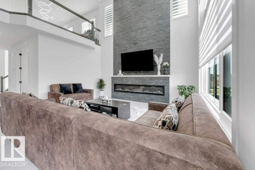 424 33 Avenue Nw, Edmonton, AB - Indoor Photo Showing Living Room With Fireplace