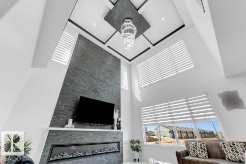 424 33 Avenue Nw, Edmonton, AB - Indoor Photo Showing Living Room With Fireplace