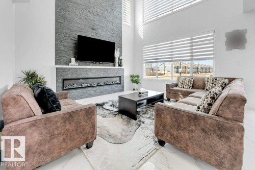 424 33 Avenue Nw, Edmonton, AB - Indoor Photo Showing Living Room With Fireplace