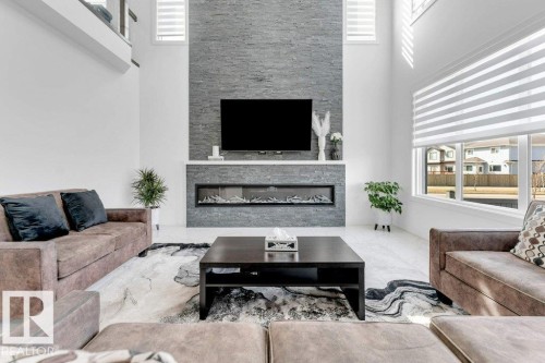 424 33 Avenue Nw, Edmonton, AB - Indoor Photo Showing Living Room With Fireplace